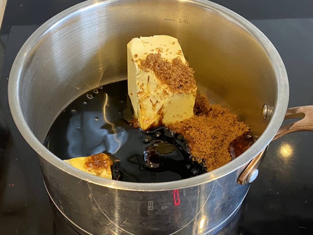 Treacle, butter and sugar in a pan.