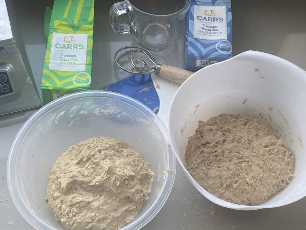 Bread dough mix in white bowls