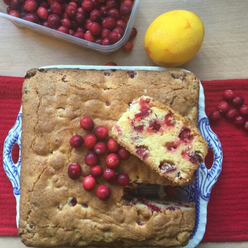 Cranberry and Orange cake on a blue plate