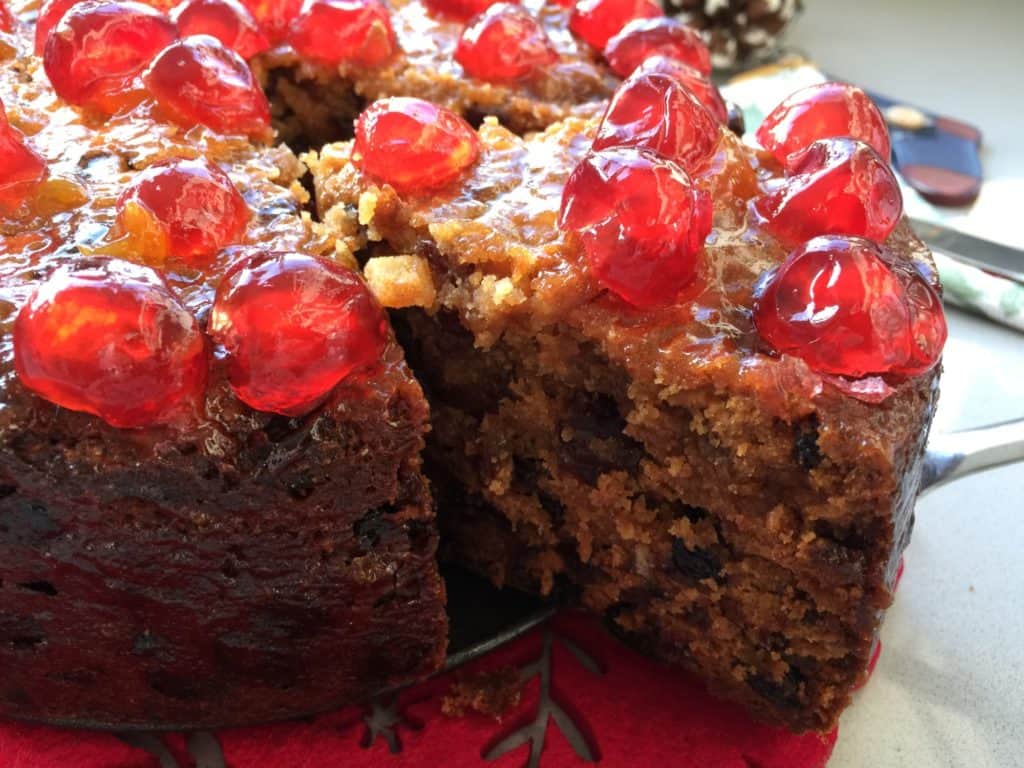 Fruit cake with a slice cut out