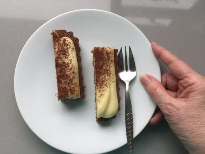 Slices of cakes on a white plate