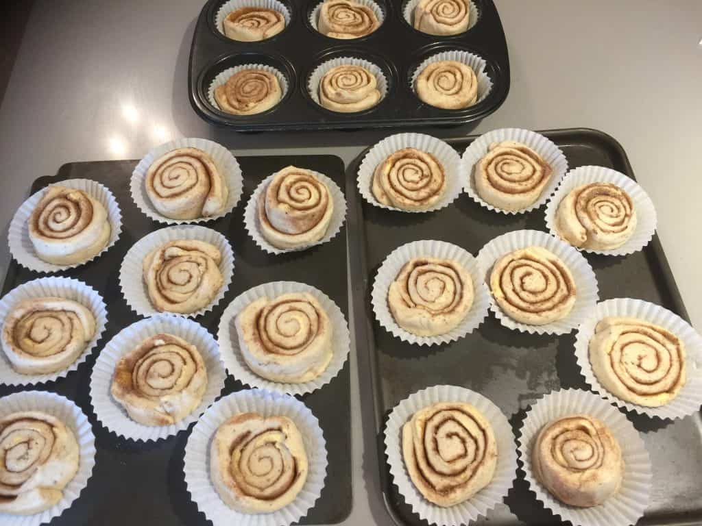 Cinnamon Buns ready to bake on baking trays