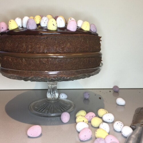 Chocolate Cake with Lindt Hazelnut chocolate spread filling. Decorated with mini sugar coated eggs.