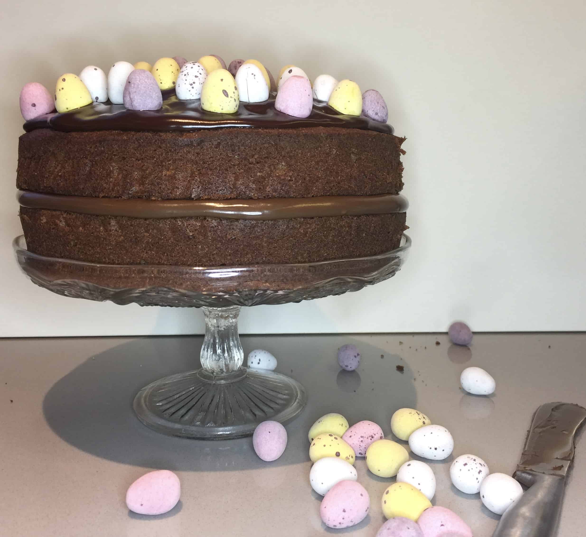 Chocolate Cake with Lindt Hazelnut chocolate spread filling. Decorated with mini sugar coated eggs.