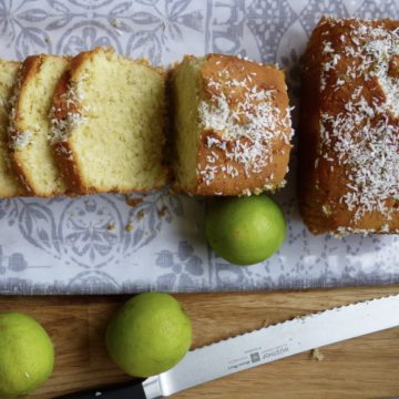 Coconut and Lime loaves. Sliced on a grey pattered plate.