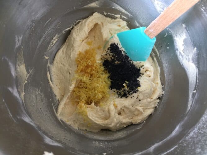 Cake mixture with Lemon Zest and Poppy Seeds in a mixing bowl