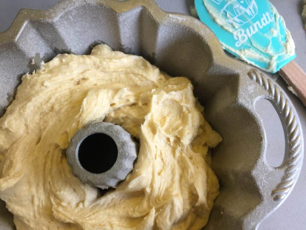 Cake batter poured into a bundt pan