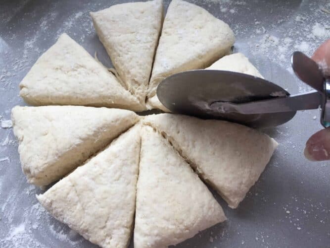 Slicing scone dough into 8 portions