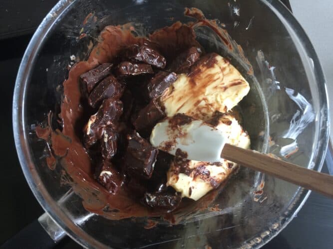 butter and chocolate melting in a bowl for chocolate glaze for Boston Cream Pie