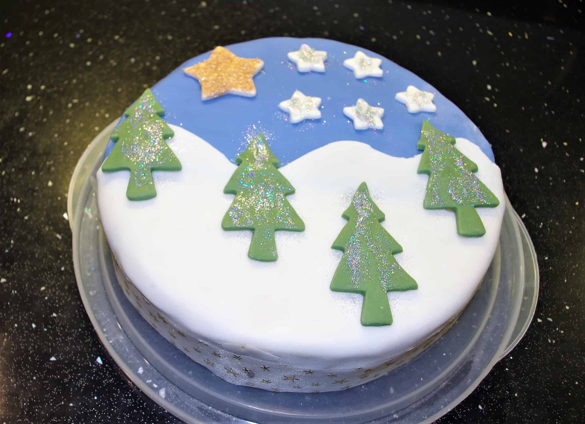 Fondant covered cake with winter forest scene