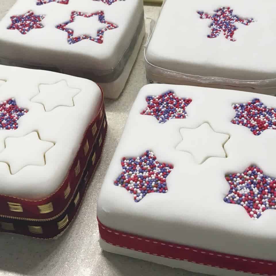 Fondant covered cakes with 6 pointed stars and glitter