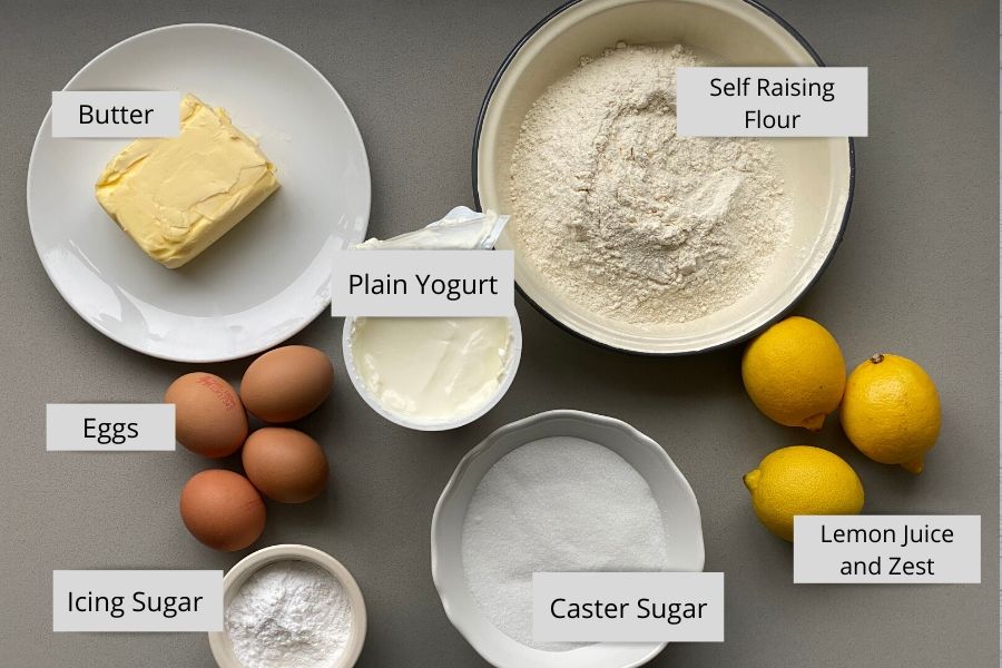 cake Ingredients in white bowls on a counter top