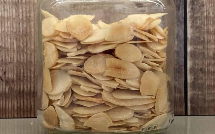 Toasted Flaked Almonds in a glass jar