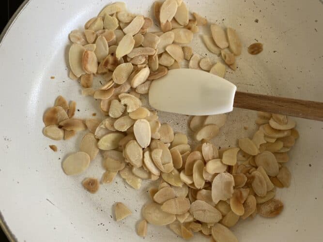 Toasted Flaked Almonds in a small frying pan