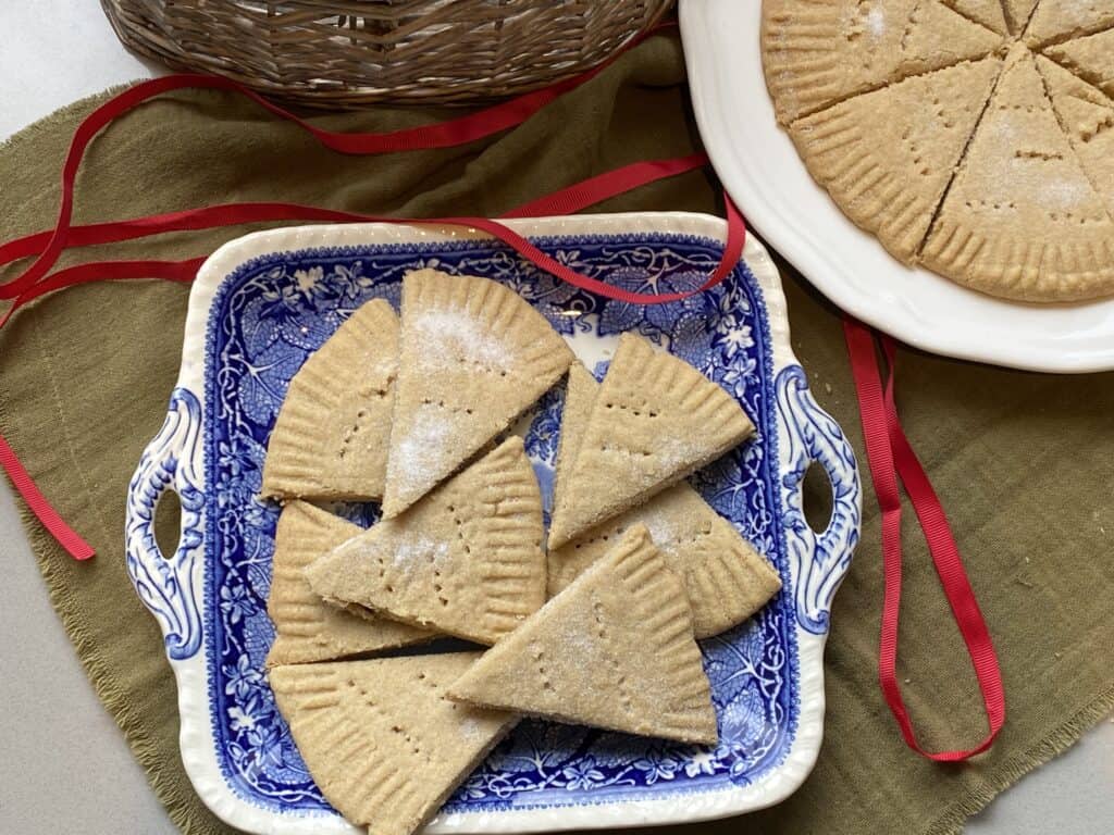 Shortbread biscuits on a blue square plate.