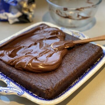 Chocolate cake on a blue plate