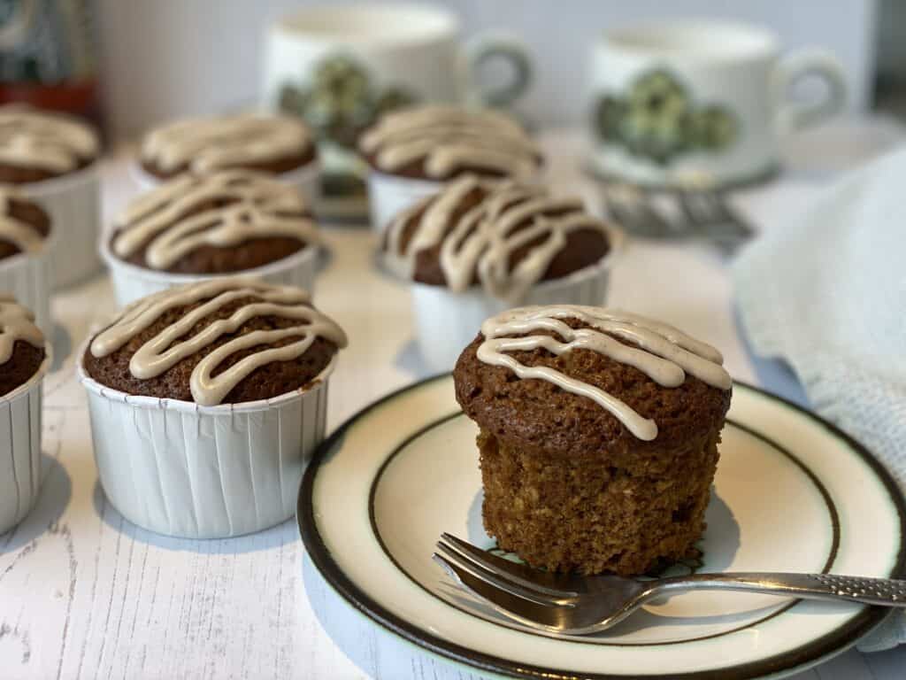 Treacle Muffin on a plate with a fork by the side
