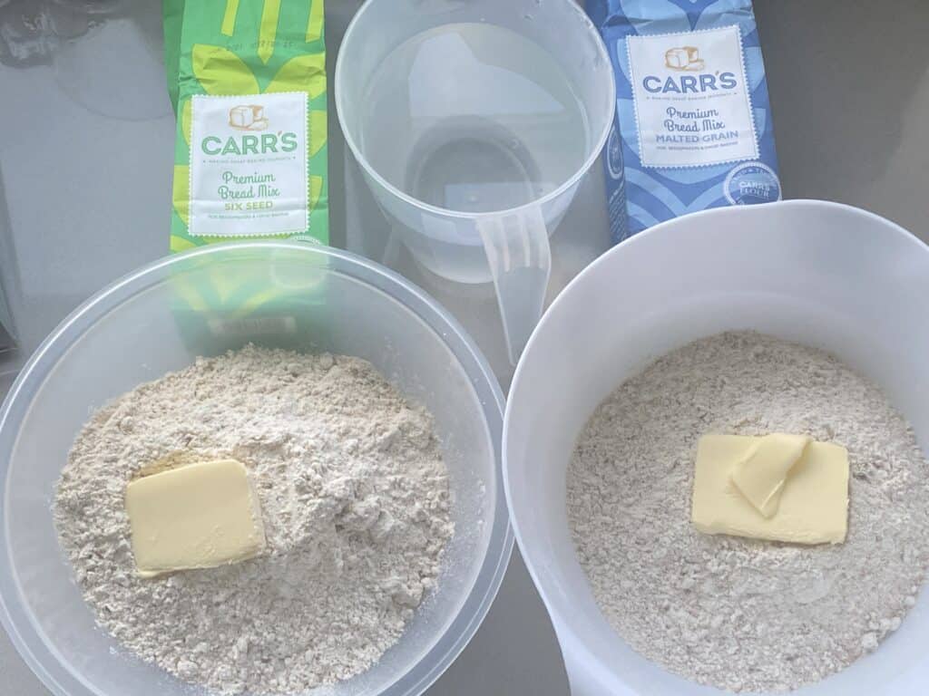 Dry bread ingredients in mixing bowls