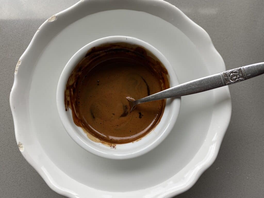 Cocoa and coffee mixture in white dishes