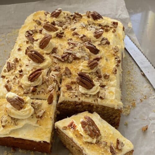Pecan Cake with a slice cut out.