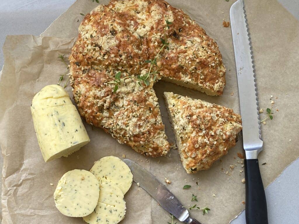Round of Cheese scones with a slice cut out