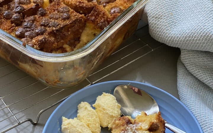 Serving of Pandoro Choc Chip Bread & Butter Pudding